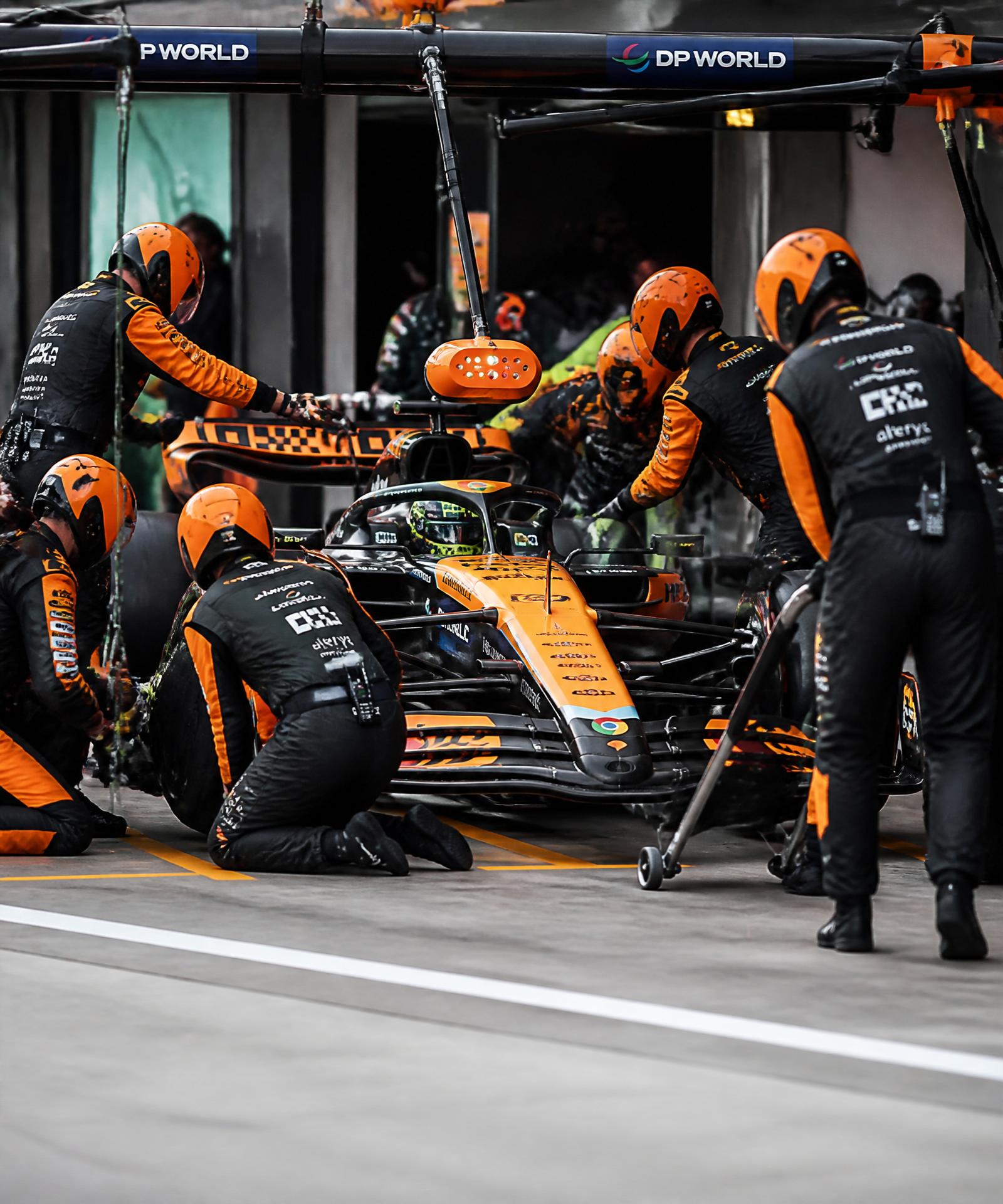 Formula 1 pit crew mid-pitstop
